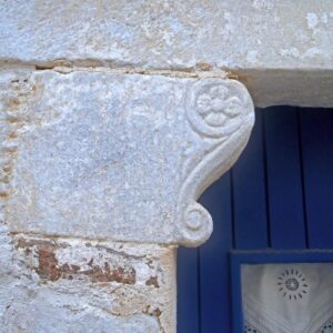 Marble element on the door of a mansion in Marpissa.