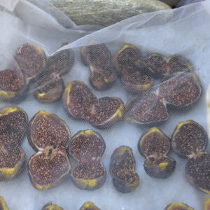The figs are sun-dried for approximately 20 days, covered with thin cloths.